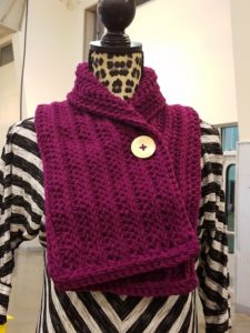 Free crochet scarf pattern with playful button by Hooked by Kati