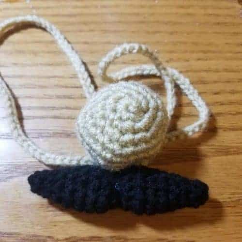 mustache nose warmer free crochet pattern | Hooked by Kati