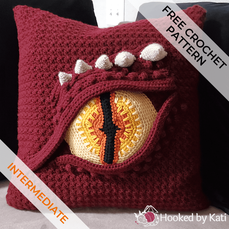 Free Dragon Eye Pillow Crochet Pattern from Hooked by Kati